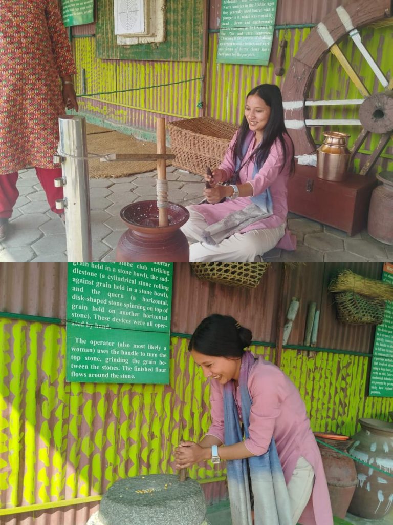 Roshani Basnet operating a traditional Nepali madani ,janto during a cultural activity