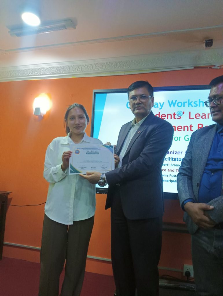 Roshani Basnet receiving a certificate at the PABSON One-Day Students' Learning Enhancement Workshop.