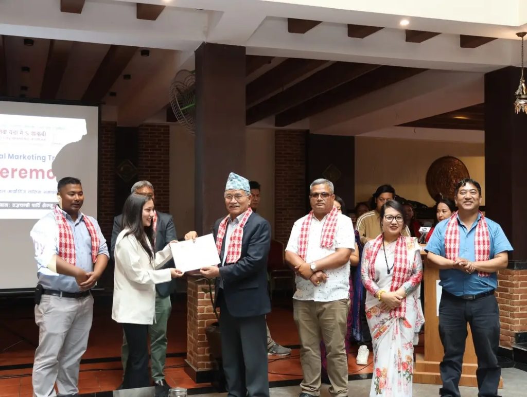 Roshani Basnet receiving a certificate after completing 50 days of Digital Marketing Training